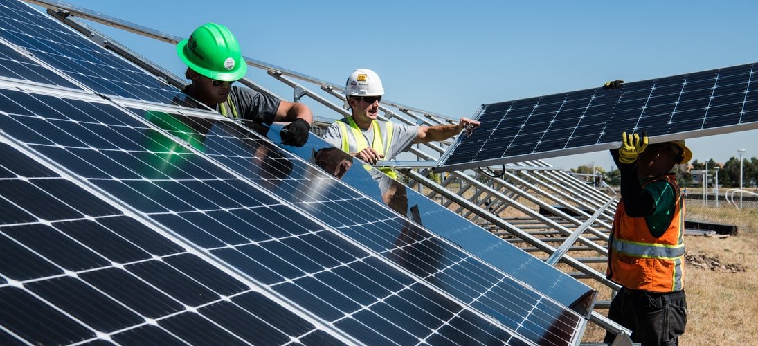workers-installing-solar-energy-farm